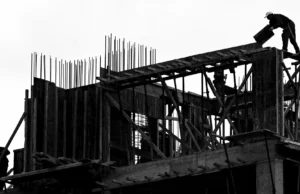 How Small Teams Can Use the NIST AI Risk Management Framework to Stay Ahead of AI Risk Illustration of a small team collaborating on AI risk assessment for sustainable building design using NIST framework guidelines