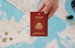 Person reviewing official travel advice documentation on a tablet device before international trip